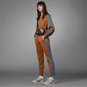 🔥RARE ADIDAS MONOGRAM TRACK PANTS ONLY🔥